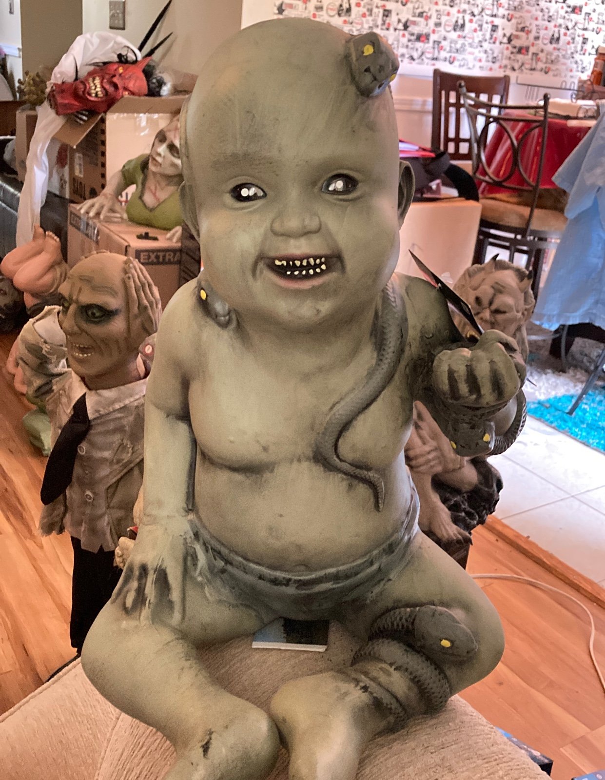 Spirit Halloween zombie baby Ronnie the Rebel