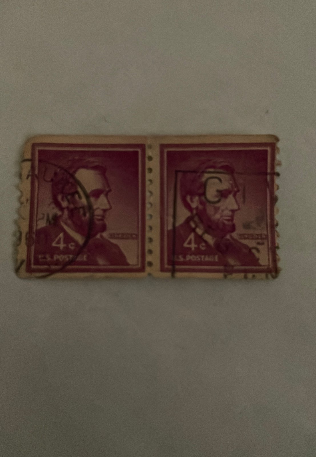 A pair of rare vintage Lincoln four cent stamps