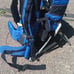 Kelty baby holding hiking backpack