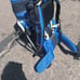 Kelty baby holding hiking backpack