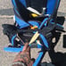 Kelty baby holding hiking backpack
