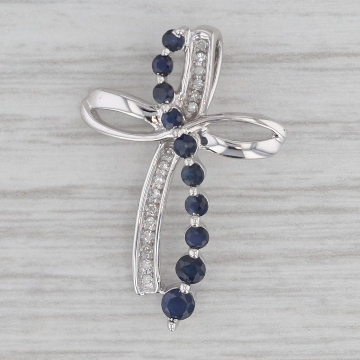 0.65ctw White Diamond Blue Sapphire Cross Pendant 10k White Gold