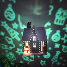Bath and Body Works holiday projector wallflower plug in