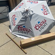 New in the box Coors light patio umbrella