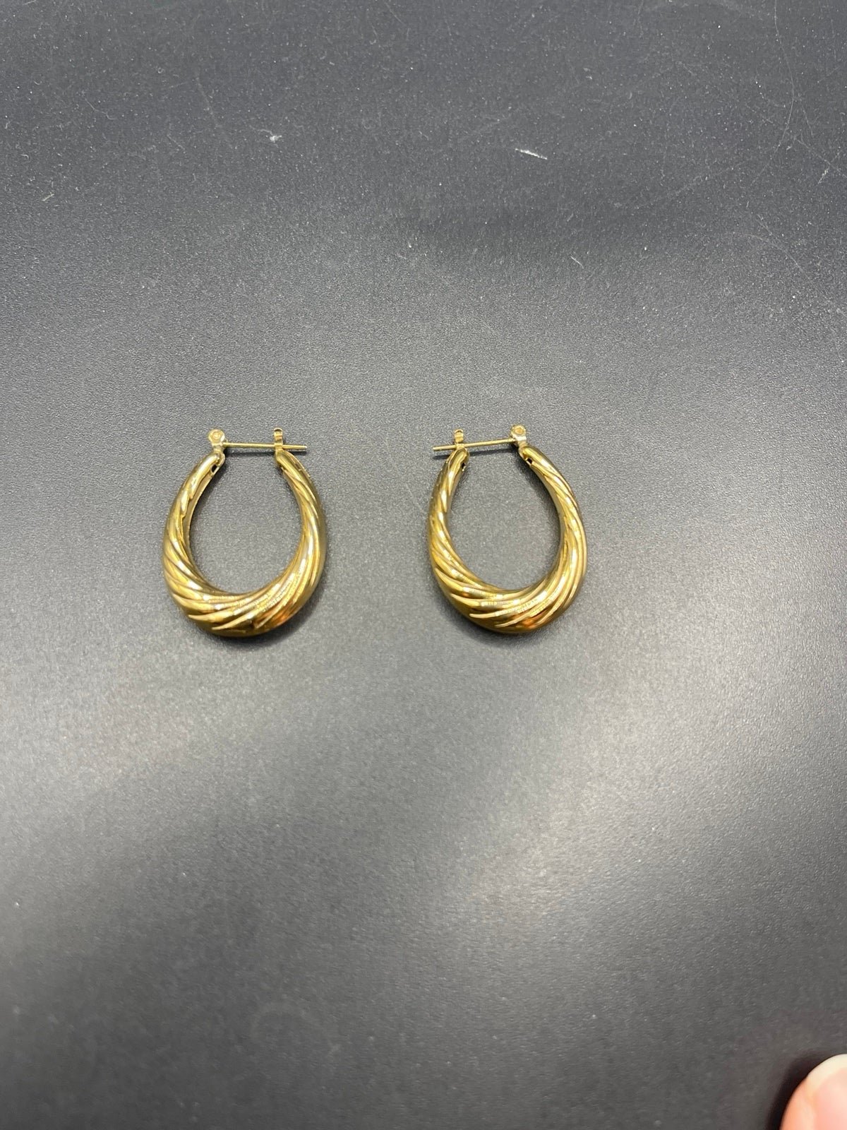 Earrings 14 K puffed oval w/design signed H 102321@
