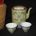 Chinese Teapot with Cups in Basket
