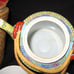 Chinese Teapot with Cups in Basket