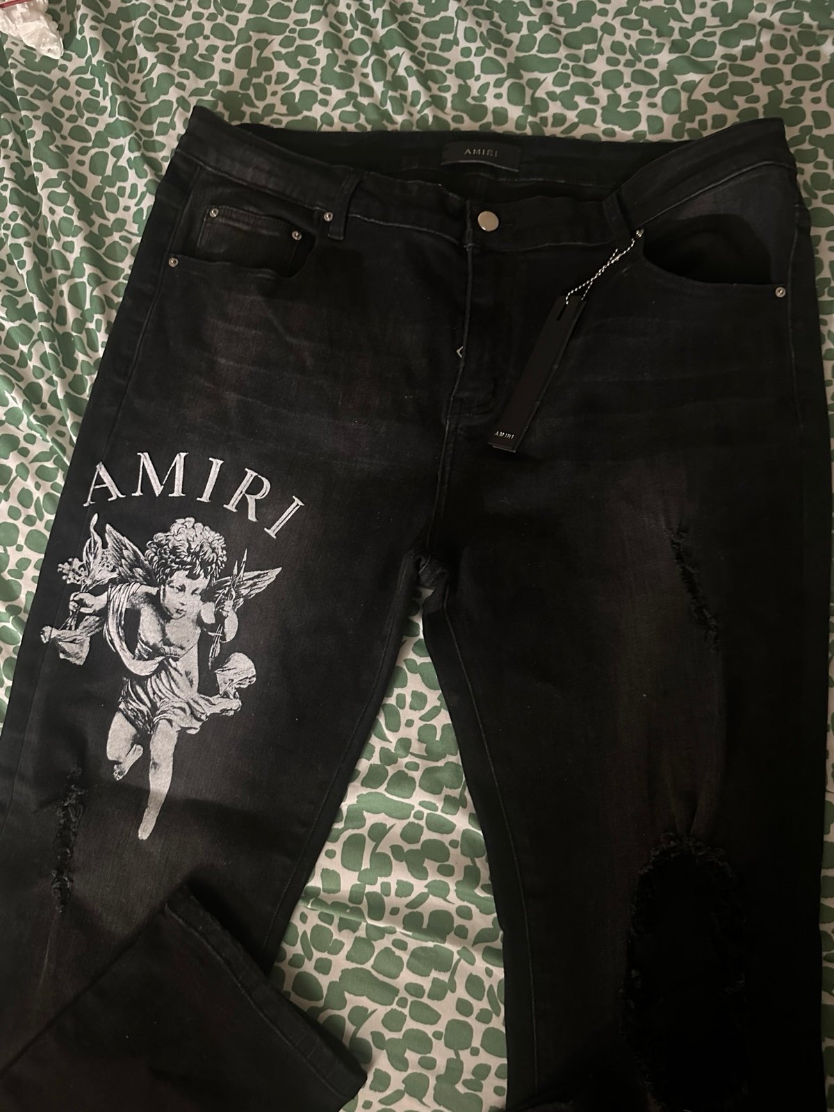 AMIRI JEANS RIPPED DENIM
