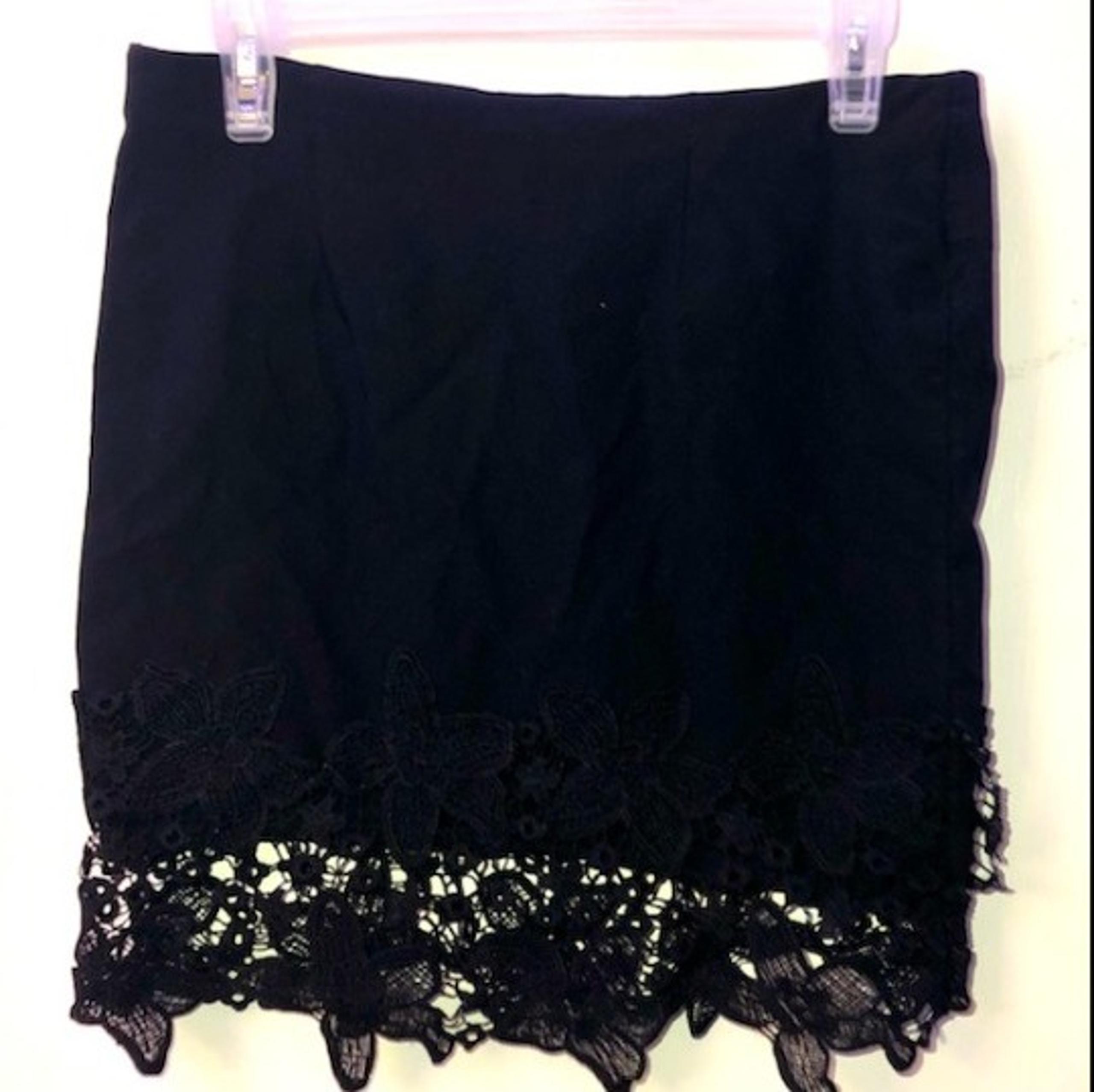 Black skirt with floral lace on the bottom