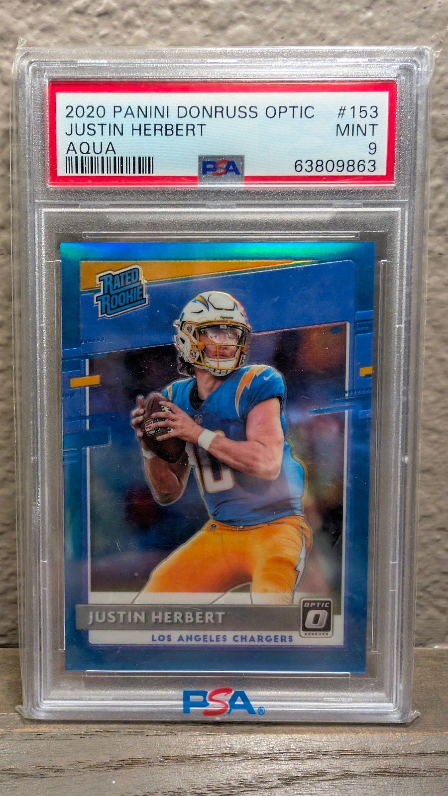 2020 Optic Football Justin Herbert Aqua Rated Rookie /299 PSA 9