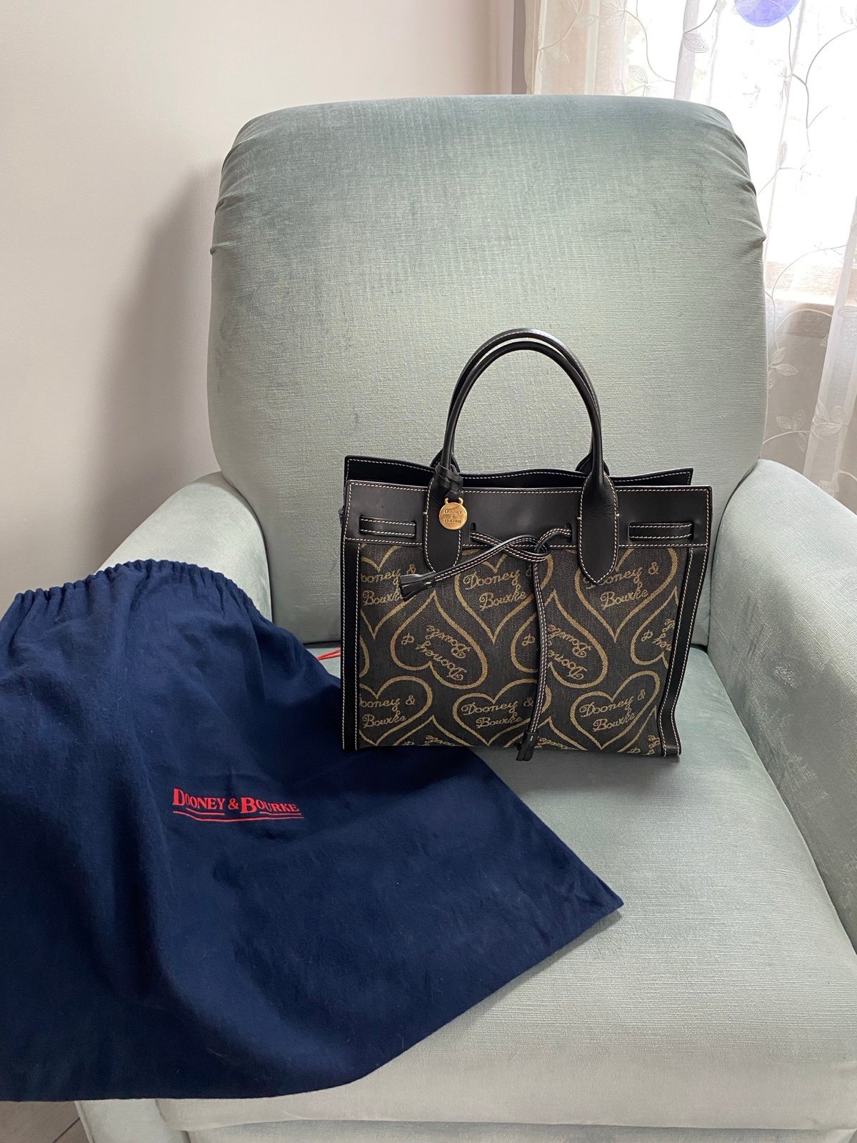 Dooney & Bourke Black and Tan heart design tote bag with dust bag EUC