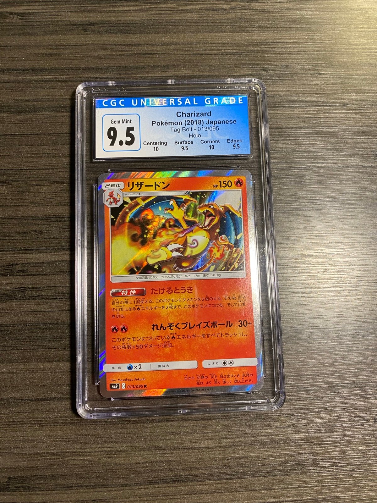 Pokémon Charizard Tag-Bolt Japan CGC