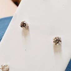 Diamond studs 1/4carat total weight.