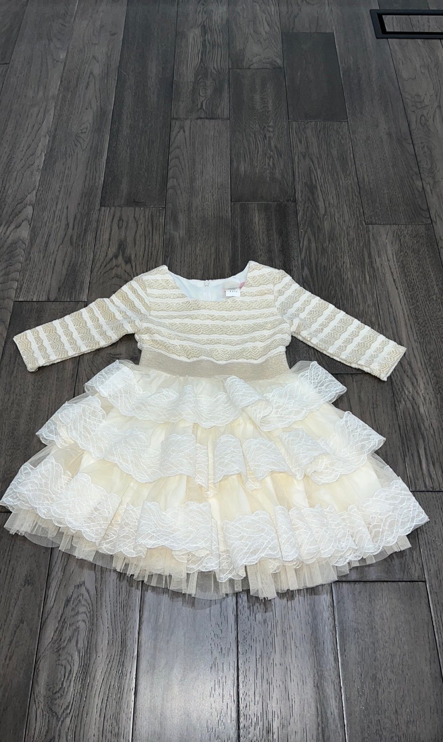 Girls gold shimmer long sleeve dress with a layered ruffle lace and tulle bottom