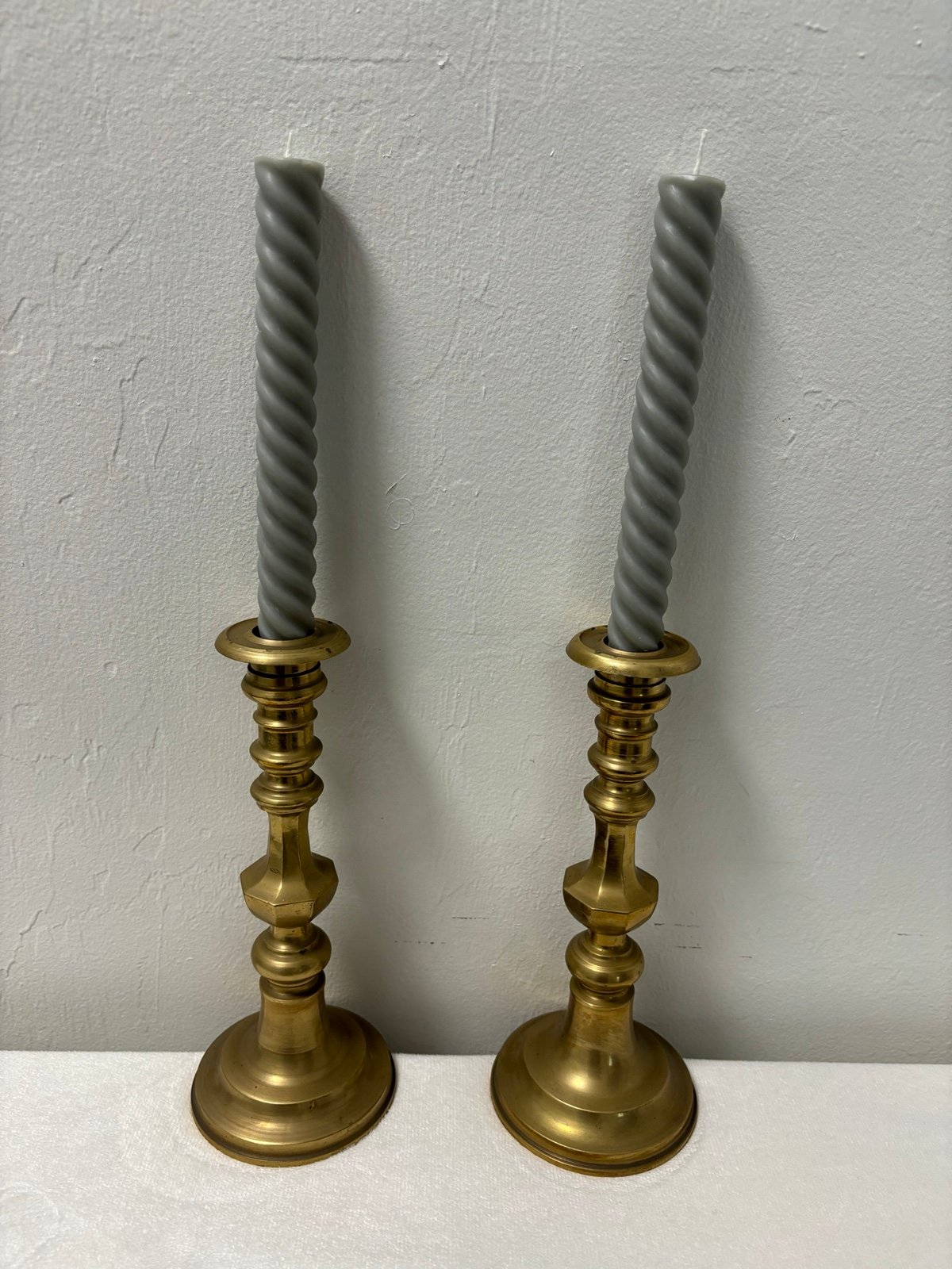 Pair of solid antique brass candle sticks