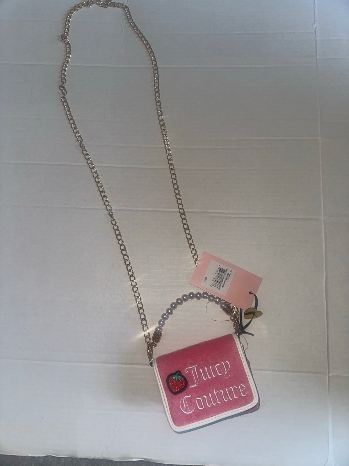 Juicy couture mini purse with long chain and pearl hand held one nwt