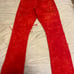 Red stacked jeans