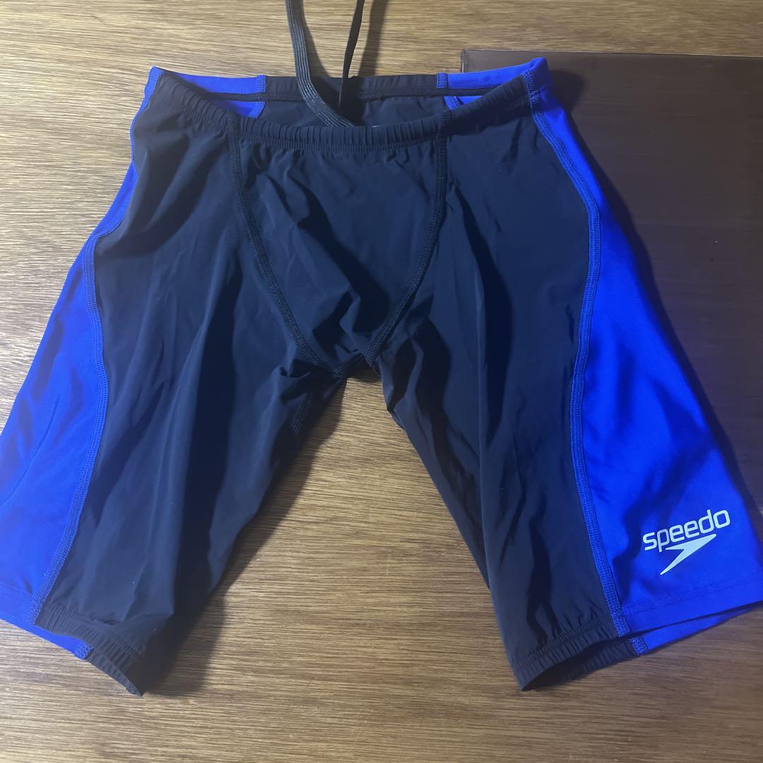Speedo racing swimsuit, size S, black and blue.