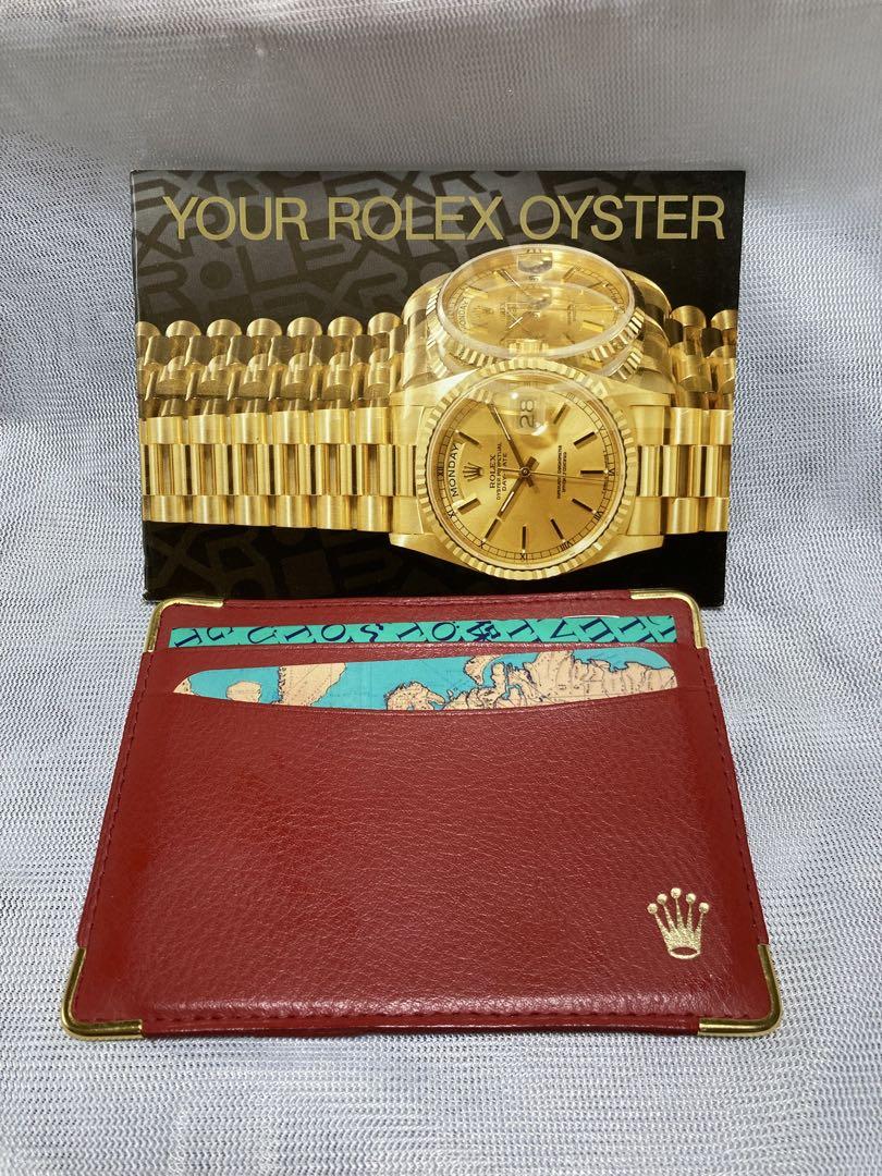 Rolex card case and other items.