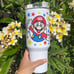 Super Mario Bros Tumbler 40 oz tumbler with hand carry handle. Brand New. 40 Oz.