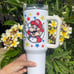 Super Mario Bros Tumbler 40 oz tumbler with hand carry handle. Brand New. 40 Oz.