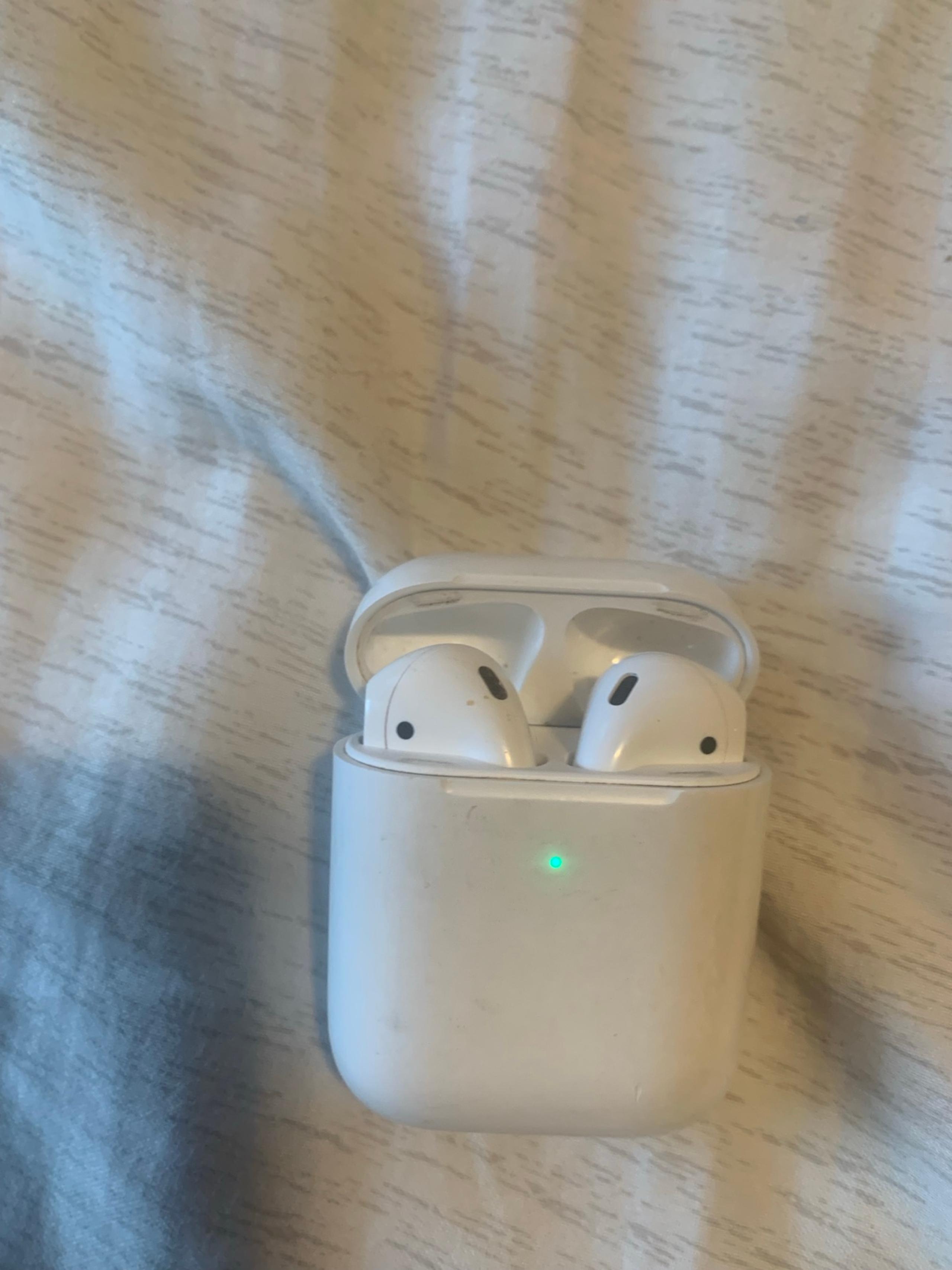Apple AirPod wireless earbuds, Bluetooth Headphones