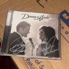 DONNY AND MARIE SELF TITLED CD SIGNED OSMOND