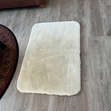 Bath rug super thick and soft no tags 36 length x 25 wide creamy color