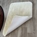 Bath rug super thick and soft no tags 36 length x 25 wide creamy color