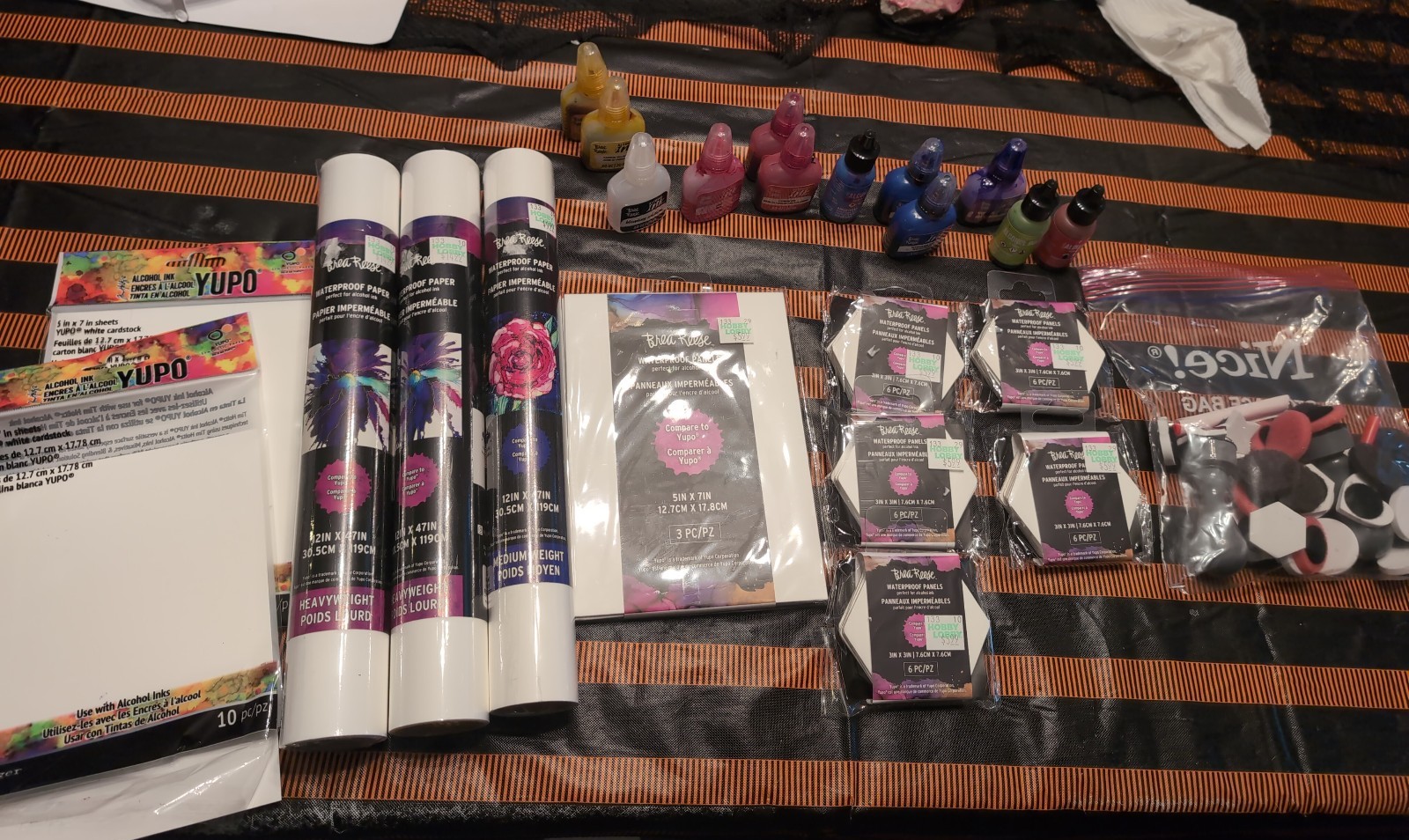 alcohol ink paper bundle with ink, panels, and stamps