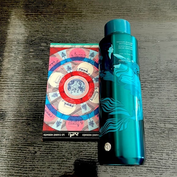 Premium Vacuum insulated tall water bottle & Hermes limited edition album.