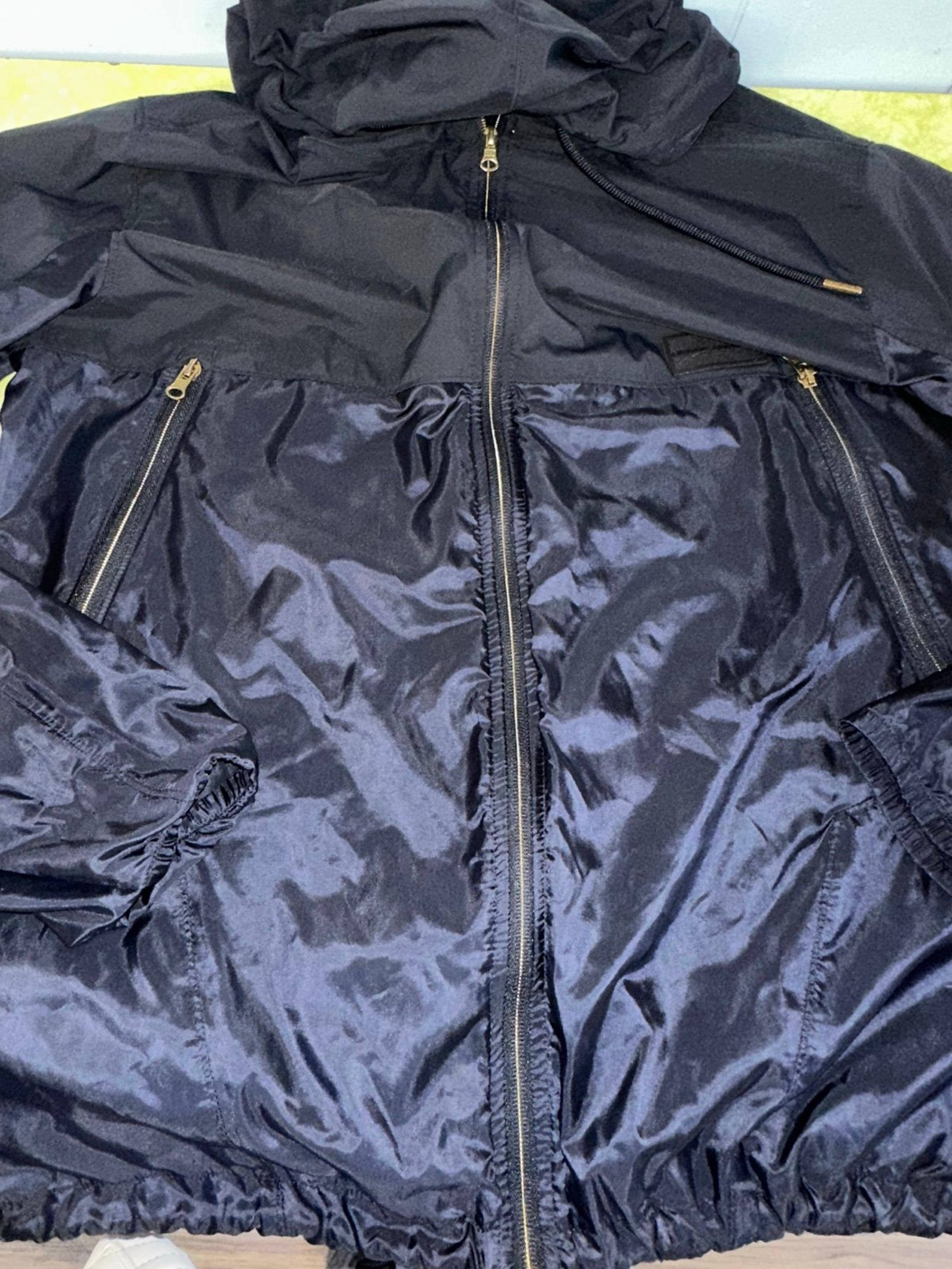 Woman black underarmour windbreaker Large