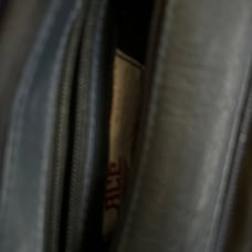 Leather messenger bag has pockets for tablets and laptops 4 total