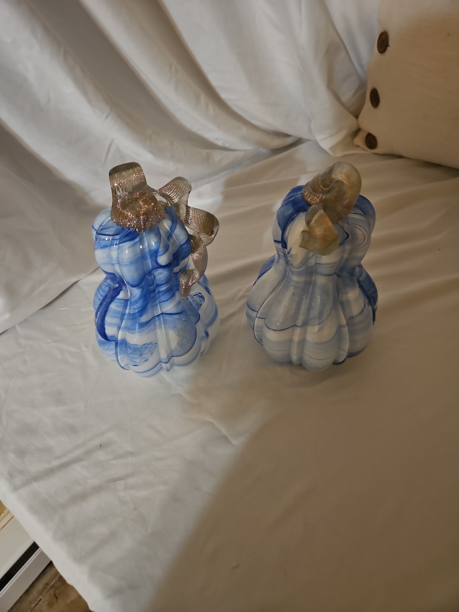 2 plue glass pumpkins