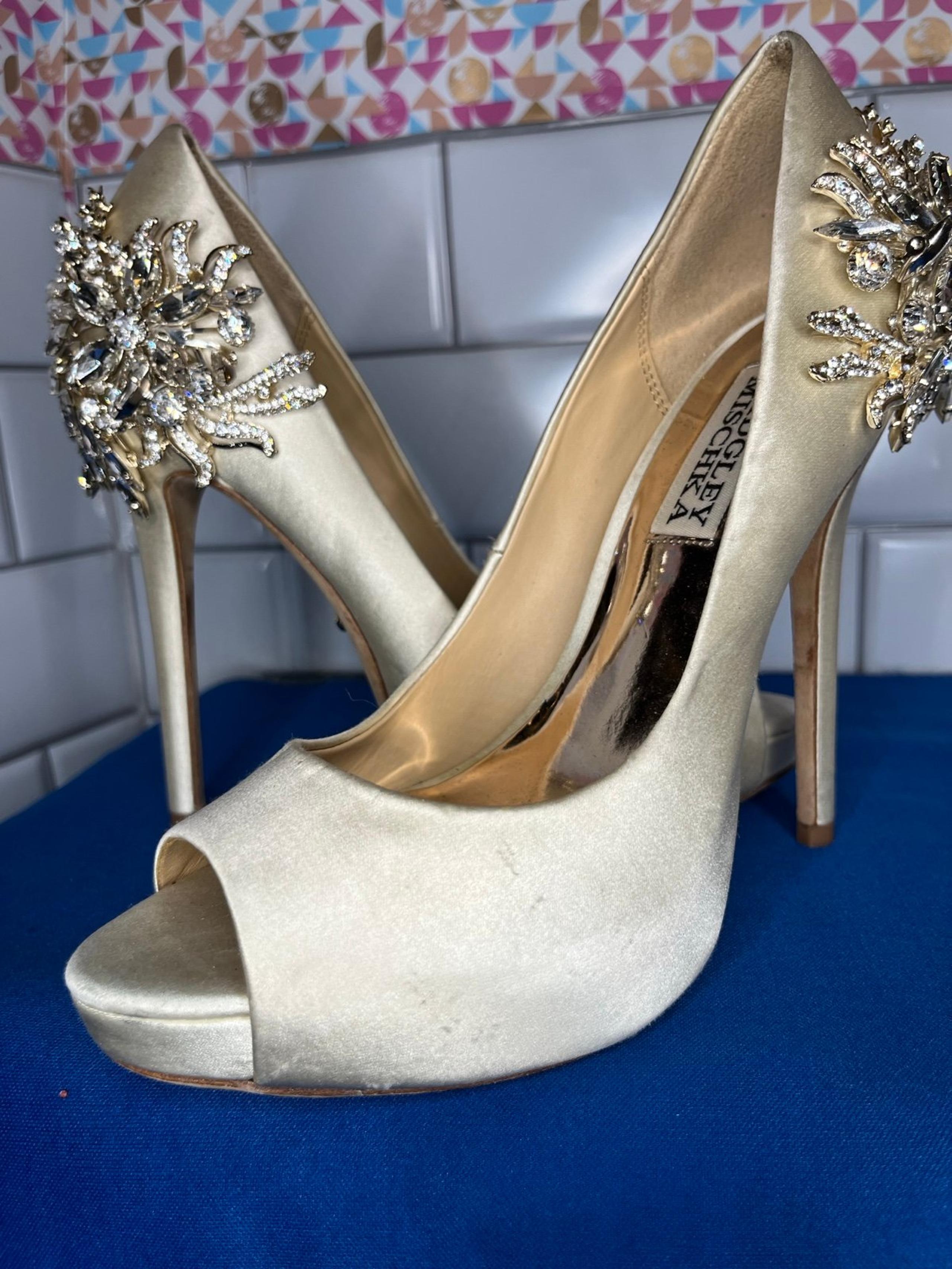 Size 5.5 MARCIA EMBELLISHED PEEP TOE PUMPS IN IVORY SATIN. 

Retail $265
