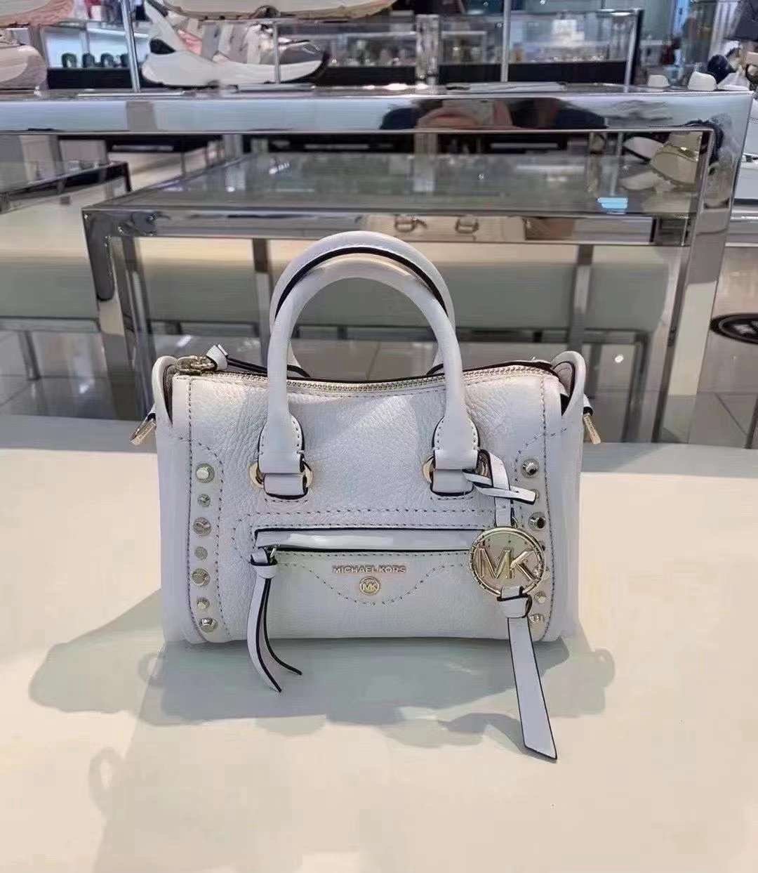 MICHAEL MICHAEL KORS Carine Extra-Small Studded Pebbled Leather Crossbody Bag