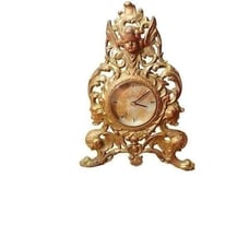Antique art deco clock, cast brass w/ hand painted Howard Miller clack assembly.