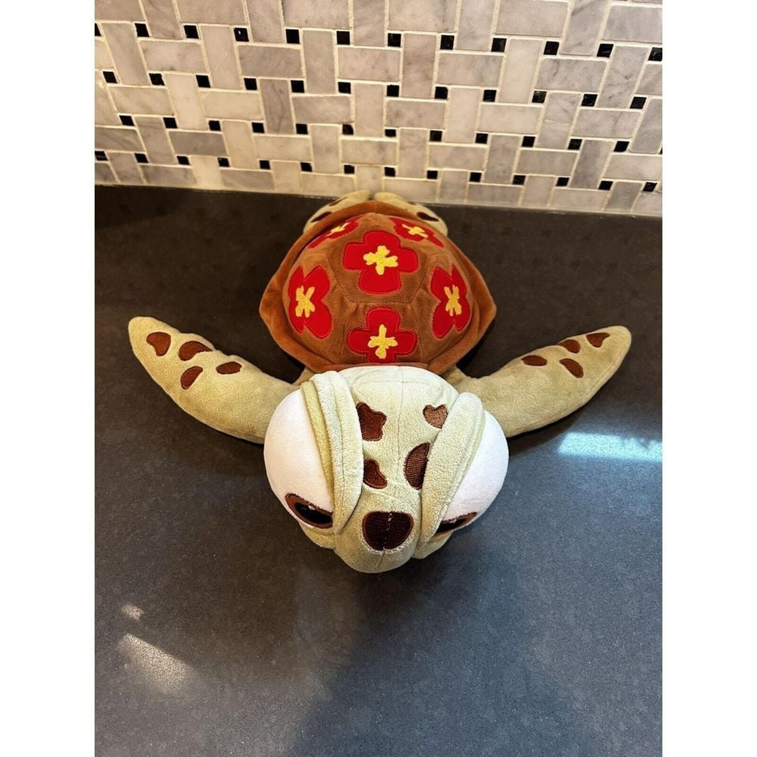 Disney/Pixar Squirt Plush 12" Finding Nemo Baby Turtle Red Yellow Flowers...