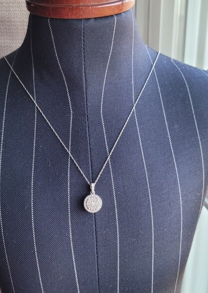 Rhodium over 10kt gold and diamond necklace. 18