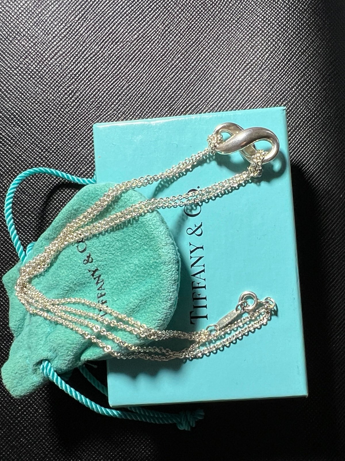 Tiffany silver infinity necklace with double chain.