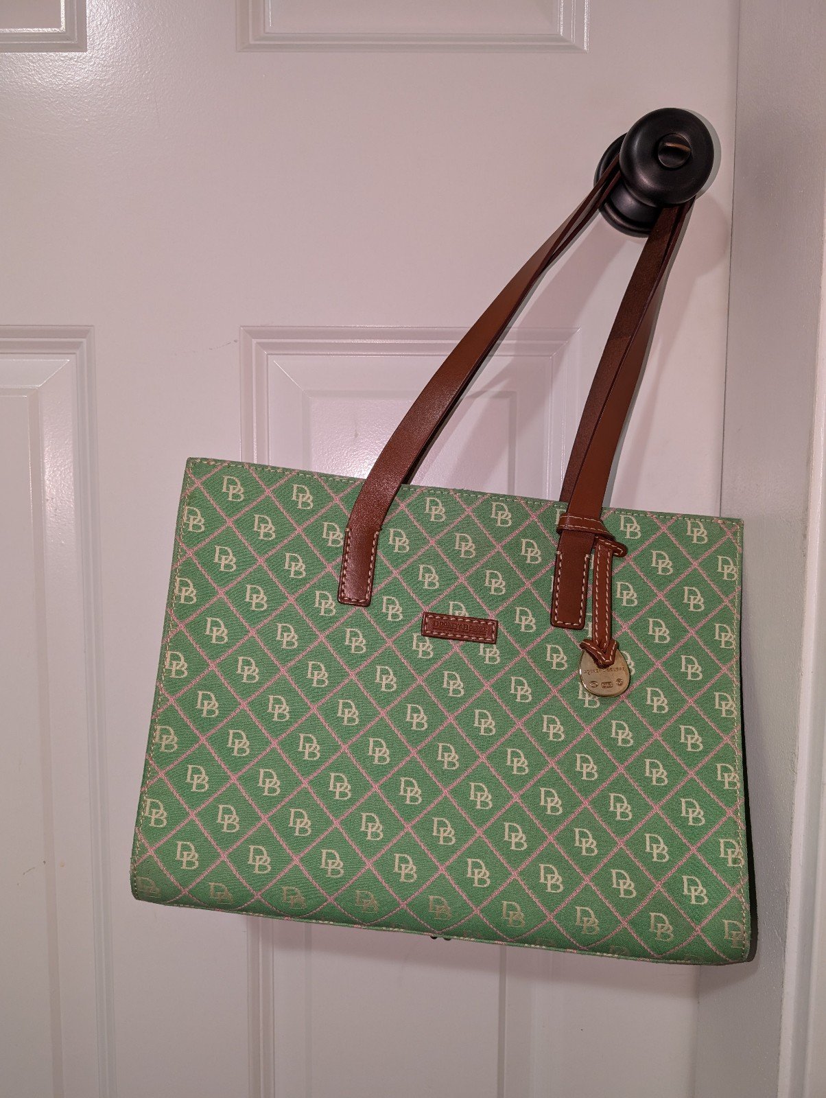 Dooney and Bourke green and pink purse