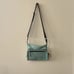 NWOT Free People Movement All Weather Mini Messenger Bag