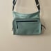 NWOT Free People Movement All Weather Mini Messenger Bag