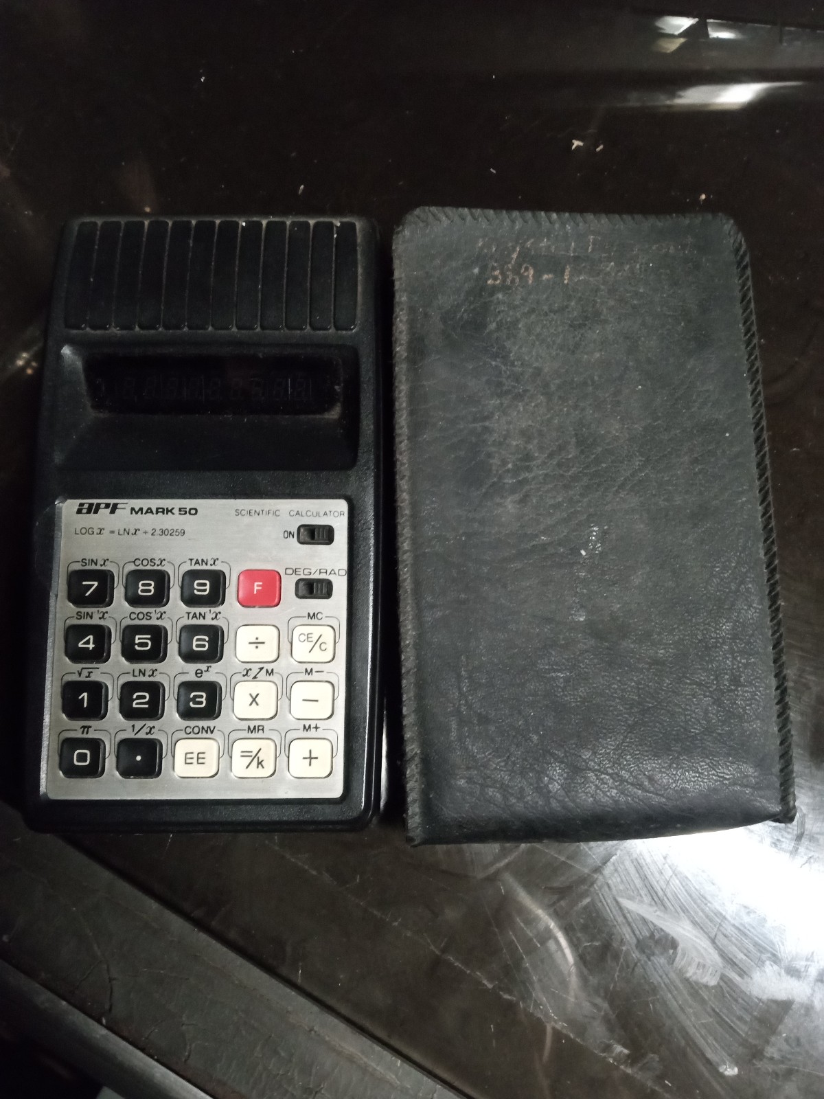 Vintage APF Mark 50 scientific calculator with pouch