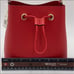 MICHAEL KORS SURI SMALL BUCKET XBODY FLA