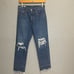 Levi’s Premium 501 Original High Rise Distressed Cropped jeans in bottom line‎