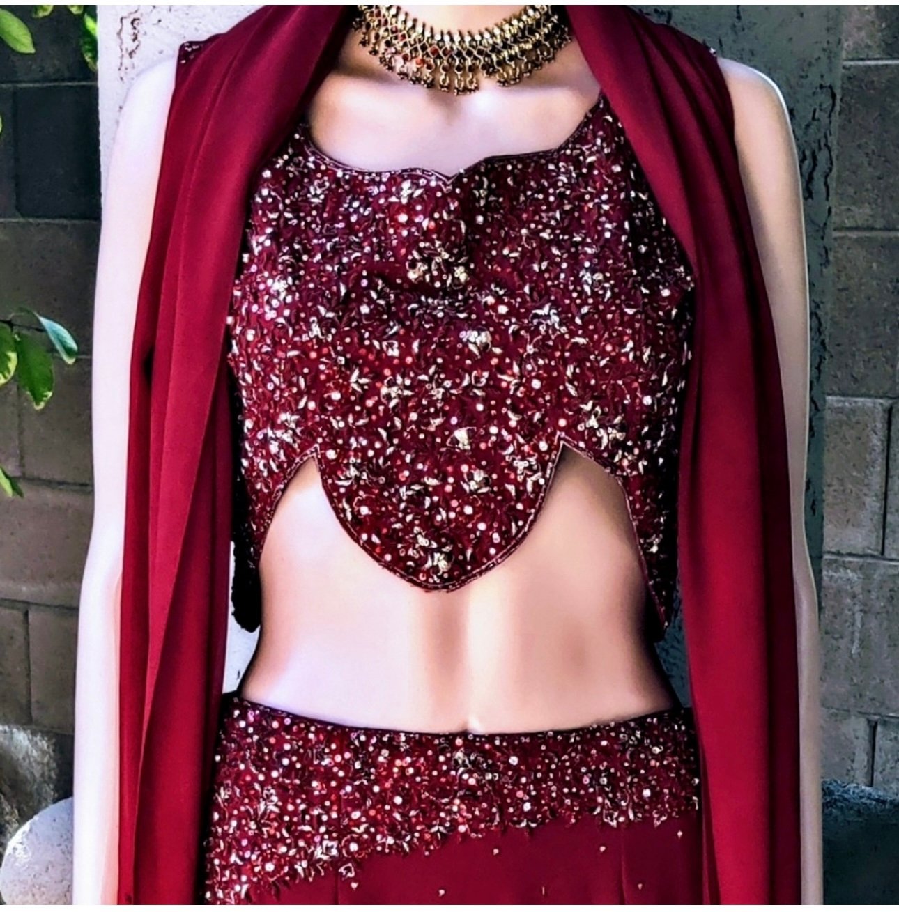 Maroon Georgette beautiful Lehenga Choli and Dupetta. Size is 36 inches bust