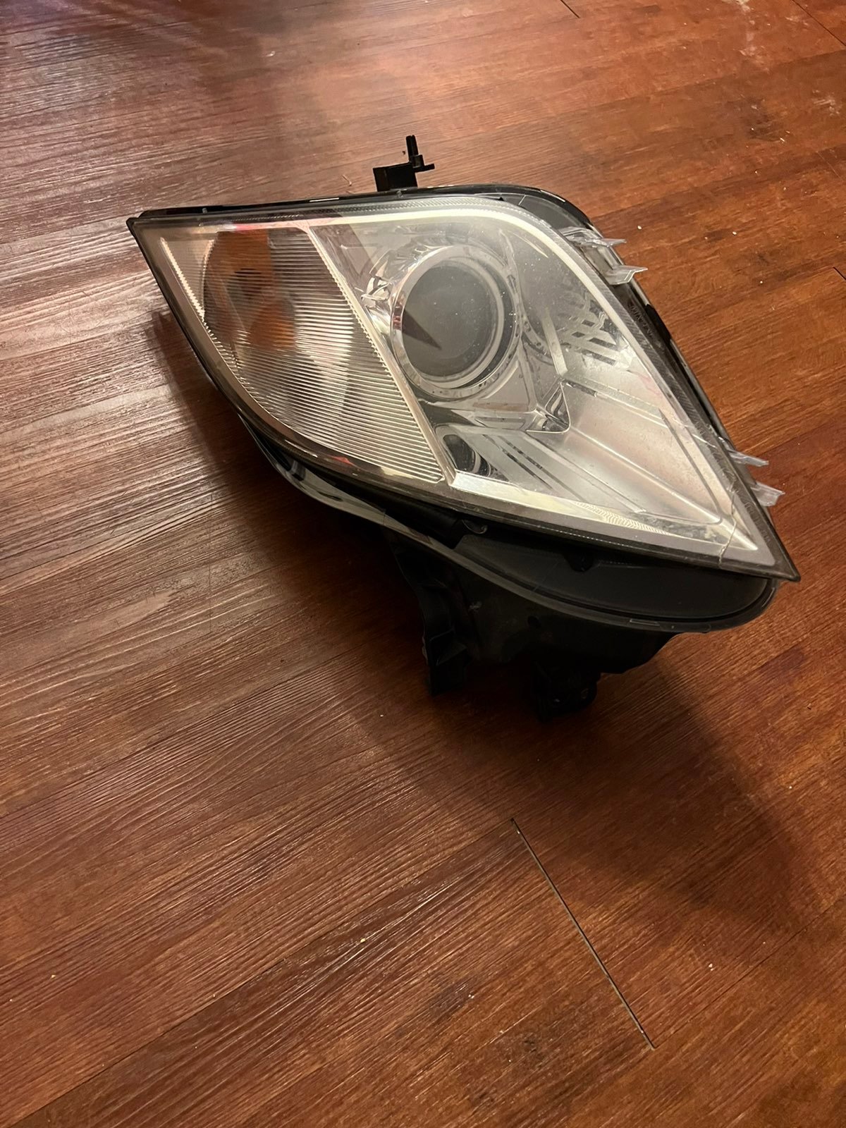 Drivers side headlight assembly 2010 mercury millan