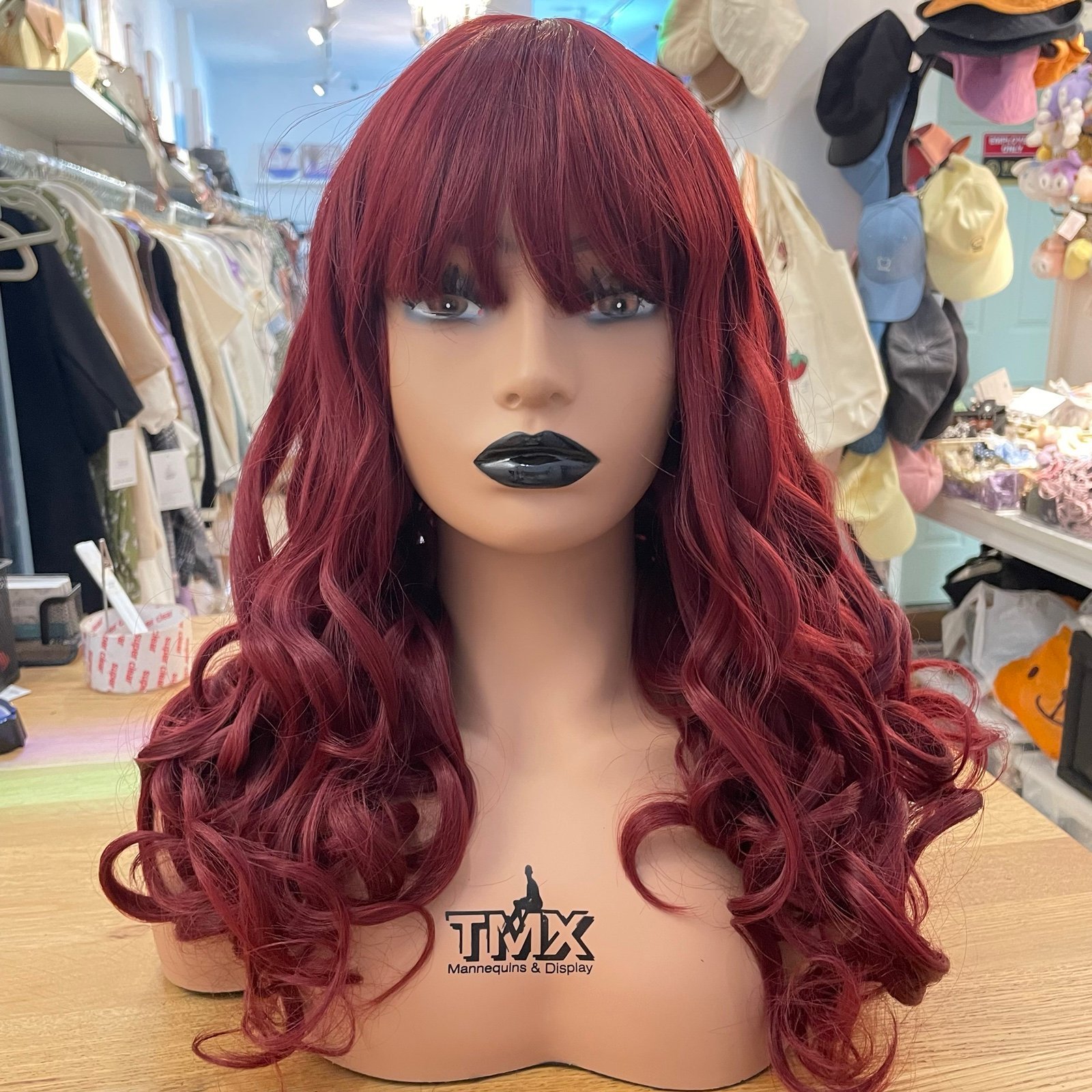 Human hair blend burgundy curly wavy wig.