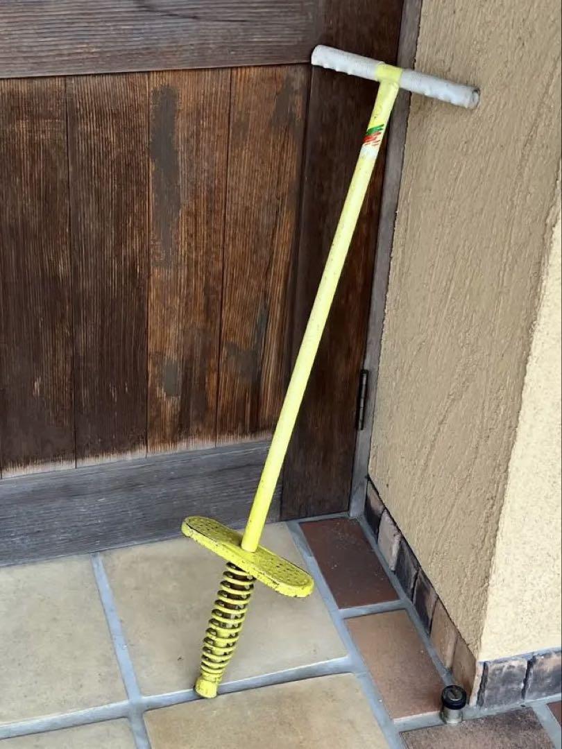 Yellow Hopping Toy with Spring